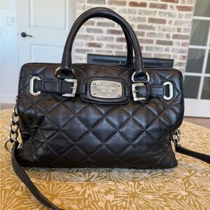 pre-owned black quilted leather Michael Kors